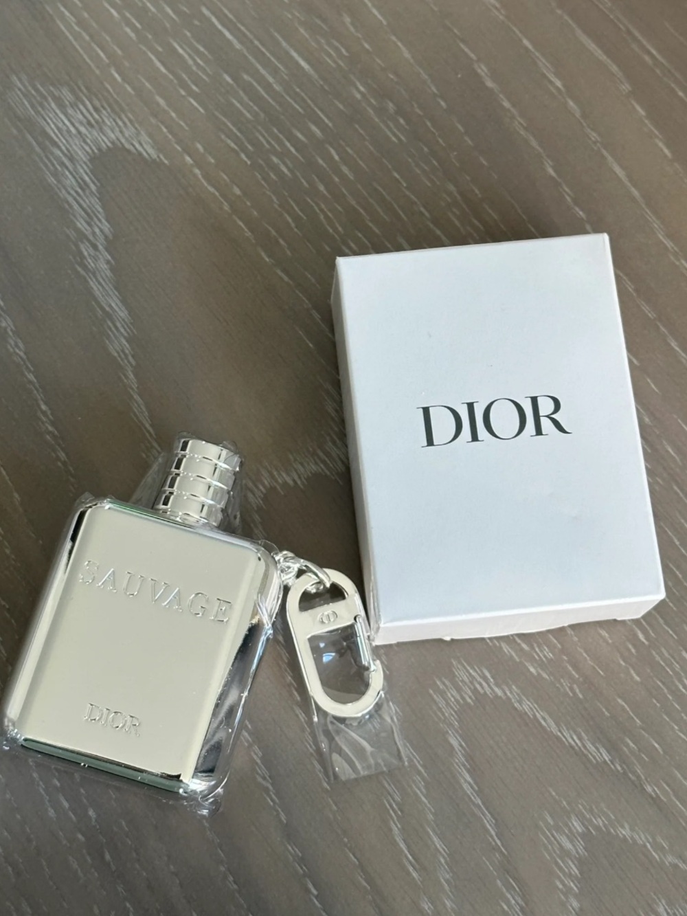 Dior Sauvage charm or pendant